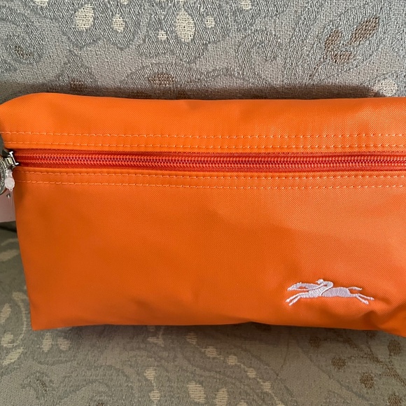 Longchamp Bags Nwt Longchamp Le Pliage Nylon Pouchorange Poshmark